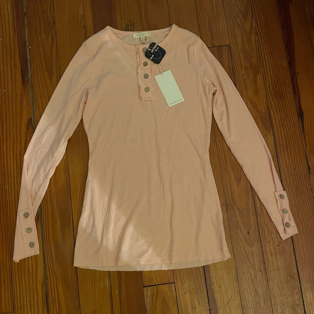 Never worn long sleeve shirt